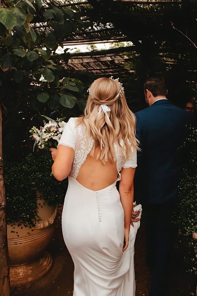 Chic white wedding dress with open back
