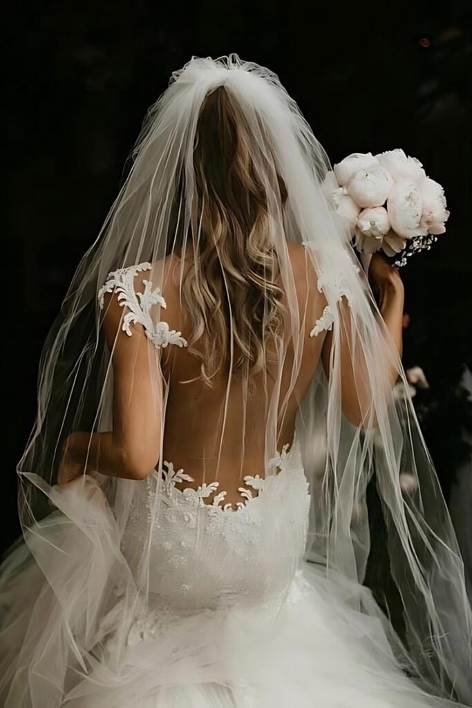 regal backless wedding dress inspired by a majestic white peacock