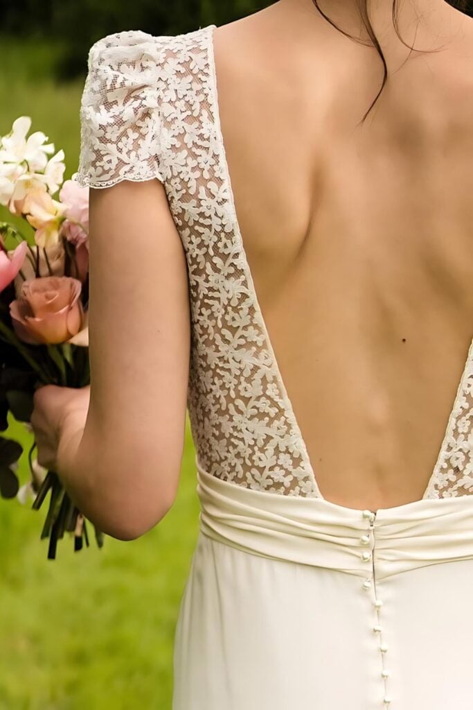 elegant backless wedding dress with cap sleeves