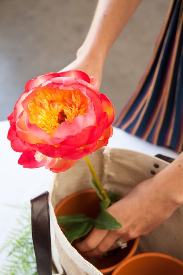 diy wedding centerpieces add flowers in bag