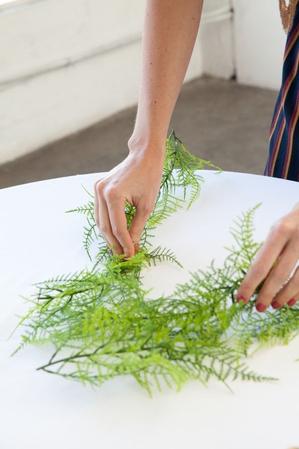diy wedding centerpieces laying greenery
